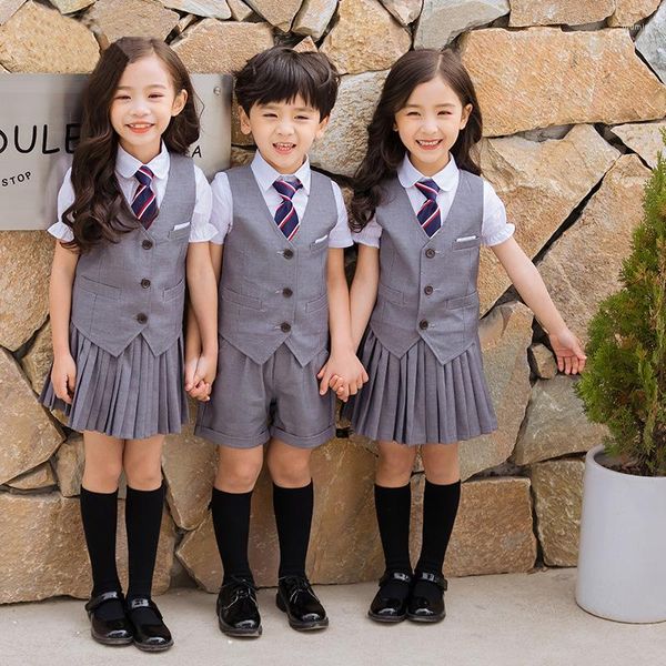 Completi di abbigliamento Bambini Uniforme scolastica coreana Ragazzi Ragazze Gonna a pieghe Gilet Top Set di prestazioni per bambini Stage Wear Student Outfit