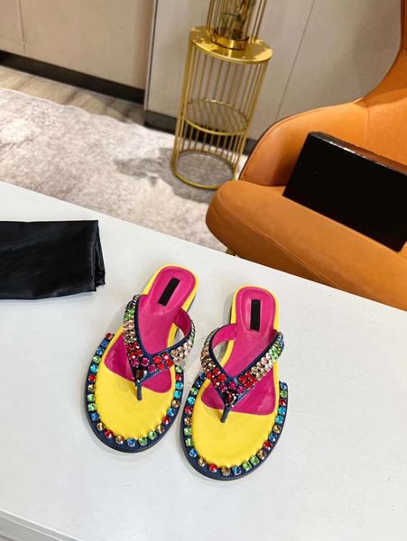 Pantofole da donna Ultimi sandali da spiaggia con diamanti colorati Scarpe in rilievo Designer da donna da uomo in bianco e nero arancione Scivolo estivo 35-45