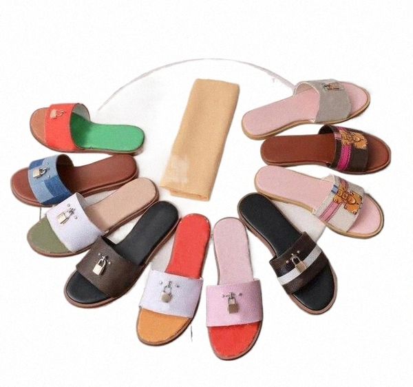 Designer Mulheres chinelas de moda Fashion Lock Sinpper Sandals Sandals Genuine Cowhide Sapatos de couro plana Grande tamanho 35-42