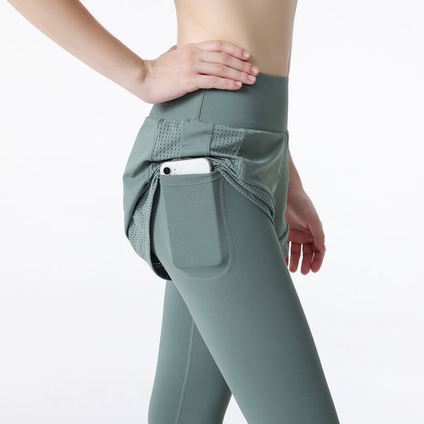 Leggings Pantaloni da yoga Autunno Inverno Nuovi vestiti da donna Pantaloni finti in due pezzi Fitness Sport Stretto Allenamento nudo Pantaloni a nove punte Pantaloni da jogging per ragazze