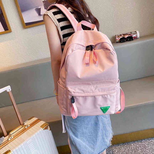 Backpack de bolsas escolares Mochila feminina 2022 Nova versão coreana Tendência de grande capacidade estudantes do ensino médio Meninos e meninas Bag 220831