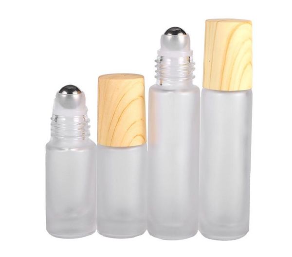 Bottiglie a rullo in vetro smerigliato 5ml 10ml Rotolo su bottiglia con sfera in metallo Coperchi in plastica a grana di legno per profumo Olio essenziale Balsami per labbra SN388