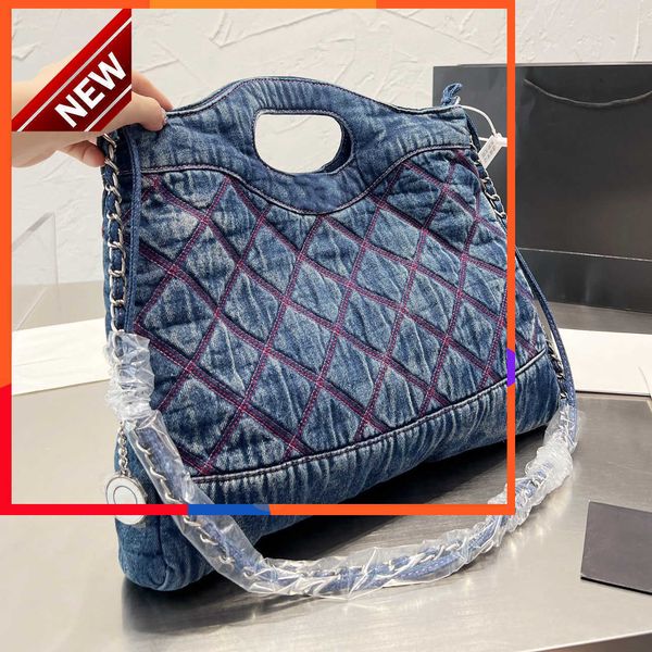 Borse dei designer di marca Borse tote in denim da donna Modello suoneria trapuntato ricamato blu e nero Catena in metallo argentato Borsa a tracolla ad alto volume Vendite dirette in fabbrica