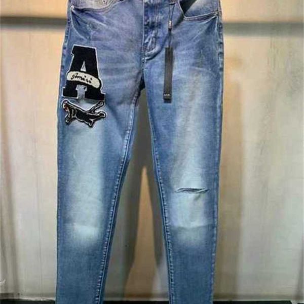 Мужские джинсы 2021 Мужские дизайнерские дизайнеры расстроенные разорванные байкерские мотоциклетные джинсовые ткани для высококачественных брюк моды для моды джинсы