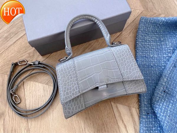 Bolsas de designers de luxo feminino 2023 Novo padrão de moda Flip Tote Sacor