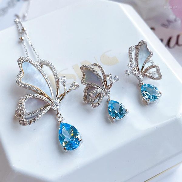 Серьги ожерелья устанавливают натуральные белые фритарию бабочка капля Санта-Мария Синяя вода.
