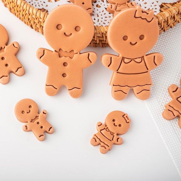 Moldes de cozimento Gingerbread Man Manger Cutters Christmas menino menina menina em relevo Ferramentas de decoração de bolo de fondante de molde