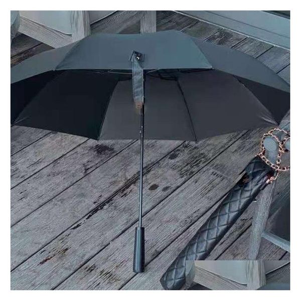 Ombrelli New Classic Ombrello lungo nero pieghevole per le donne Summer Fold Fashion Rain Vip Gift Con custodia Pu Imballaggio Drop Delivery Hom Dhoup