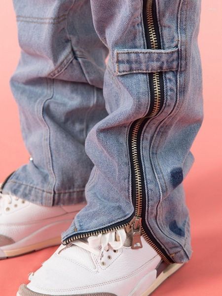 Мужские джинсы Мода Мужчины вокруг молнии прямой высокой улицы хип -хоп джинсовая ткань свободно подходит для ковбойских брюк сращиваемых брюк.