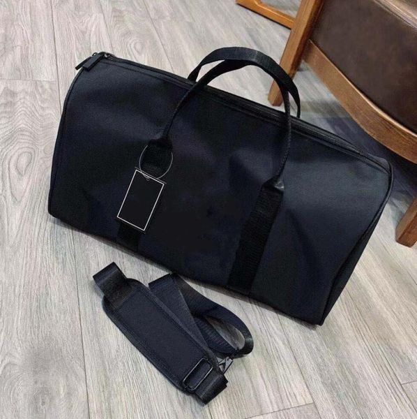 Moda Sacos de Duffel Sacos de Nylon Bolsa de armazenamento de bagagem Propertável grande capacidade Designer feminino UNISSISEX Bolsa de ombro de ombro único Pacote de viagem