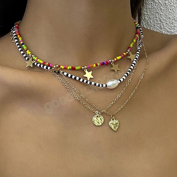 Collana girocollo corta con perline di semi colorati Boho per donna Chian a strati alla moda con collana con ciondolo cuore / stelle Set moda