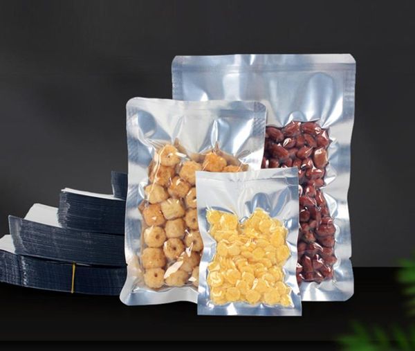 500 Stück / Menge Aluminiumfolienbeutel Heißsiegel-Vakuumverpackung Verpackungsbeutel für Snacks Vorderseite durchsichtige Mylar-Folie Lebensmittelaufbewahrungsverpackungsbeutel 5x7 cm