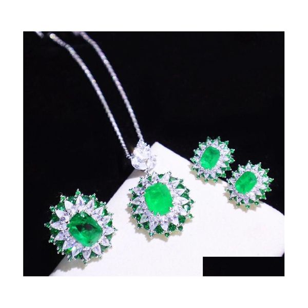 Orecchini Collana squisita Set di gioielli in argento sterling 925 Anelli con pietre preziose di smeraldo Belle donne Colore Tesoro Set di consegne a goccia Dhaxc