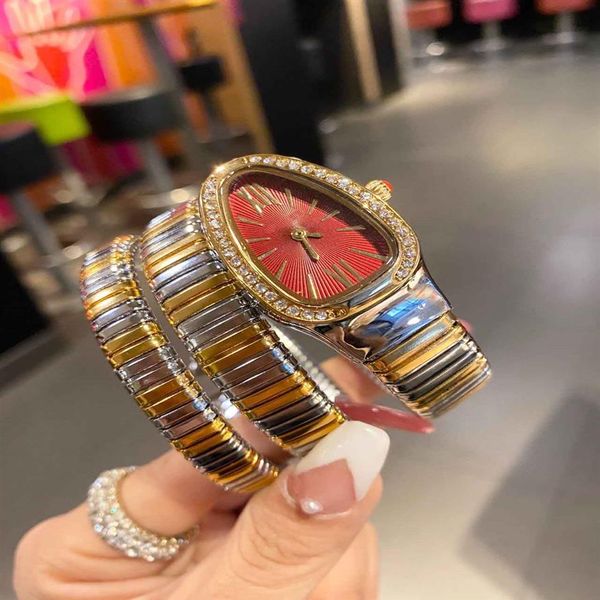 La dimensione di 32 mm dell'orologio da donna adotta la lunetta con diamanti con movimento al quarzo importato a forma di serpente a doppio surround223q