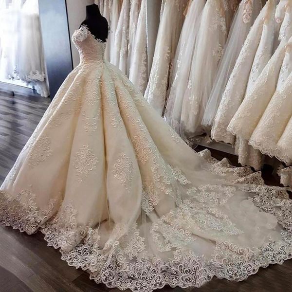 2023 Abiti da sposa vintage Ball Gown Dubai Arabia Appliques in pizzo Off spalla Plus Size Abiti da festa da sposa Robe De Marriage Corsetto Indietro