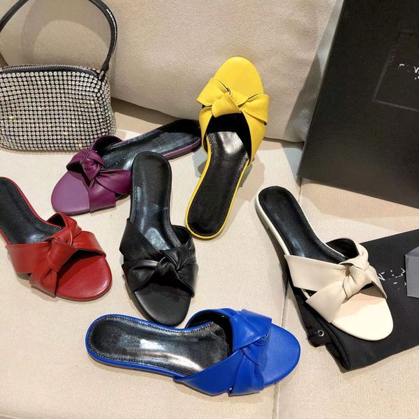 2023 Designer Donna Farfalla di colore puro Pantofole con diapositive di lusso in pelle sexy Indoor Rosso giallo blu nero Sandali con tacco piatto da donna pantofola con bocca superficiale misura di scarpe 40