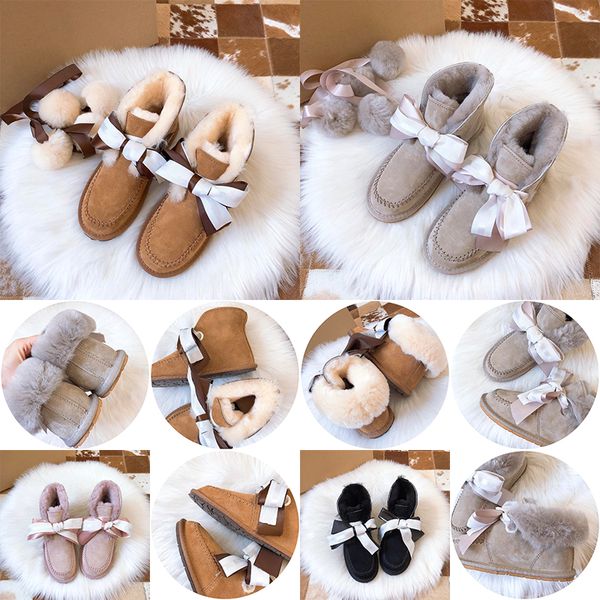2022 Çocuk Uggi Bow Saç Top Kış Kar Botları Kız Ayakkabıları Çocuklar Erkek Ayakkabı Tasarımcısı Açık Sneaker Moda Avustralya Klasik Boot Baby Kid Gençlik Yürümeye Başlayan Bebekler