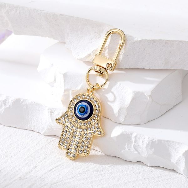 Zirkon Golden Evil Eye Hamsa Hand Schlüsselanhänger Schlüsselanhänger für Freund Paar Blue Eye Fatima Tasche Auto Schlüsselanhänger Zubehör