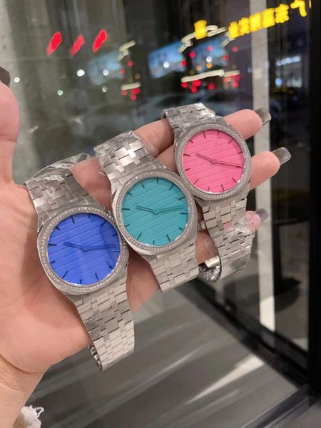 Klasik yeni çiftler tatlı şeker renk saatleri kadın erkekler kuvars kol saati geometrik daire mektup saatler kadın numarası 25 saat su geçirmez 38mm