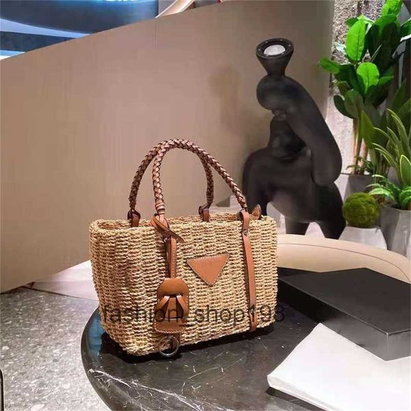 Borsa di moda Borsa di paglia femminile intrecciata in rattan Nuova celebrità a rete pendente Stessa grande capacità Elegante stile classico Alta qualità Borse organizer a spalla più recenti 2023