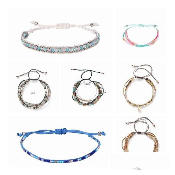 Perline 7 pezzi Bracciale multistrato Fili di semi di colore Perline Corda tessuta Spiaggia Fascino elastico Bohemian impilabile Filo rivestito di cera Adjus Dhgbn