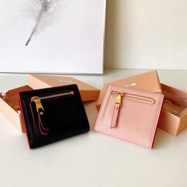 Designer handbags mumius Women's cowhide wallet 2021 new folding zero wallet short Japanese and Korean simple cute mini student slot bag
