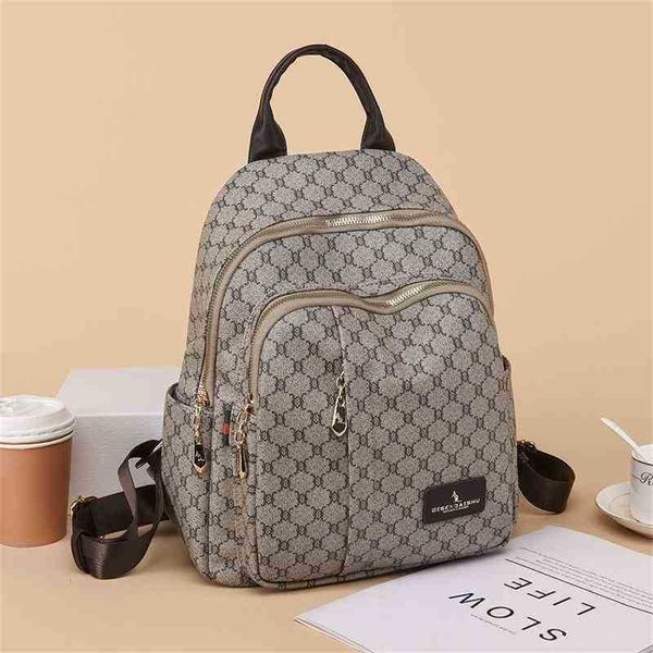 Mochilas escolares Bolsa de ombro duplo feminina nova mochila anti-roubo de alta capacidade versátil Saco de viagem sling um