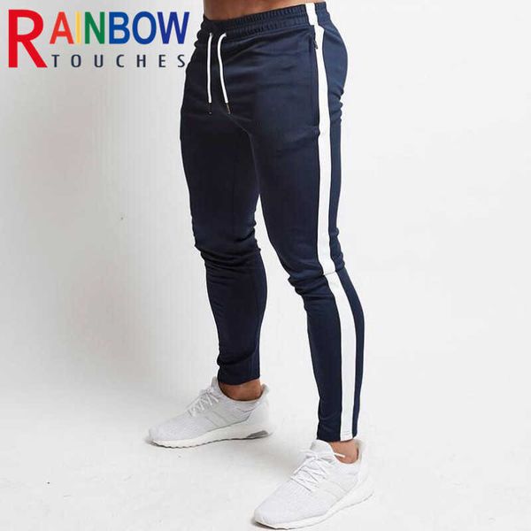 Pantaloni da uomo Pantaloni Fitness Nuovo tessuto elasticizzato sottile Design vuoto Palestra Sport Matita Pantaloni sportivi da esterno Pantaloni Rainbowtouches G220929