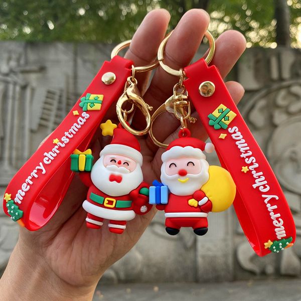 Cartone animato Pupazzo di neve Portachiavi di Natale Cinghie di Babbo Natale Calzini dell'albero di alce Borsa pendente per auto Gioielli appesi Piccolo regalo all'ingrosso 22 stili