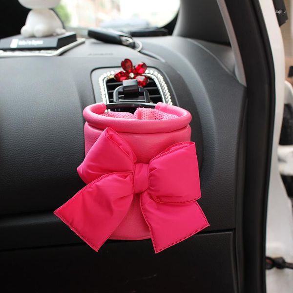 Organizer per auto Presa d'aria Presa d'aria Scatola di immagazzinaggio Fiocco rosa in pelle Porta cellulare automatico Borsa Stivaggio Riordino Accessori interni per ragazze