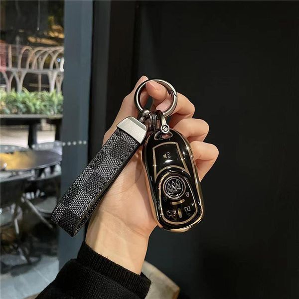 Portachiavi per auto in pelle con motivo classico Moto Veicolo elettrico Casa Chiavi in pelle anti-smarrimento a doppio uso Pendenti Accessori per bagagli