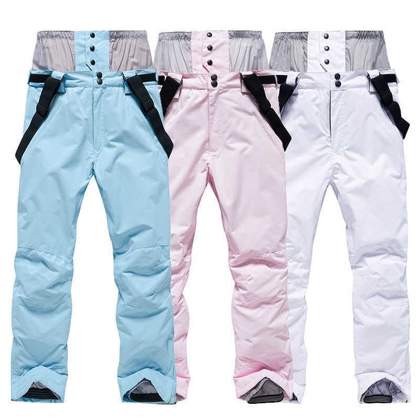 Лыжные брюки для нагрусных брюк мужчины Женщины белый розовый лыжный ветропроницаемый водонепроницаемый теплый переворот снежные брюки зимние сноуборды с защитой от талии L221025