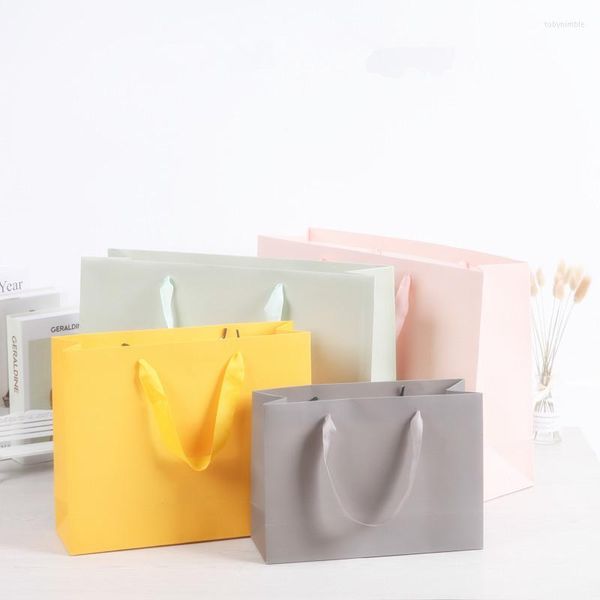 Schmuckbeutel 12pcs Portable Paper Bag Cloding Geschenkeladen Gegebene Logo Hochzeitsfeier präsentiertes Verpackung