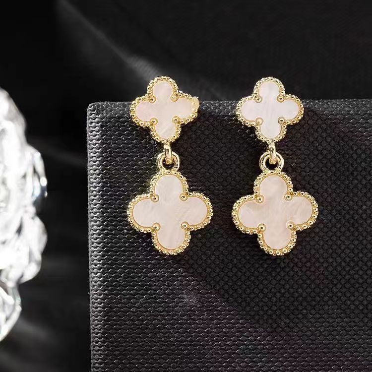 Boucles d'oreilles trèfle à quatre feuilles en acier titane pour femmes, boucles d'oreilles à pampilles simples à la mode et élégantes, cadeau de saint valentin