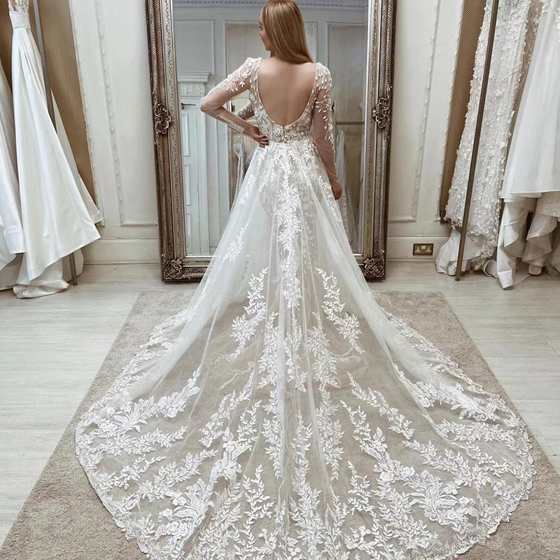 Abito da sposa a sirena in pizzo Boho con gonna staccabile Illusione Abiti da sposa da spiaggia con maniche lunghe scollo a V profondo senza schienale sexy 2024 Abiti da sposa primavera estate