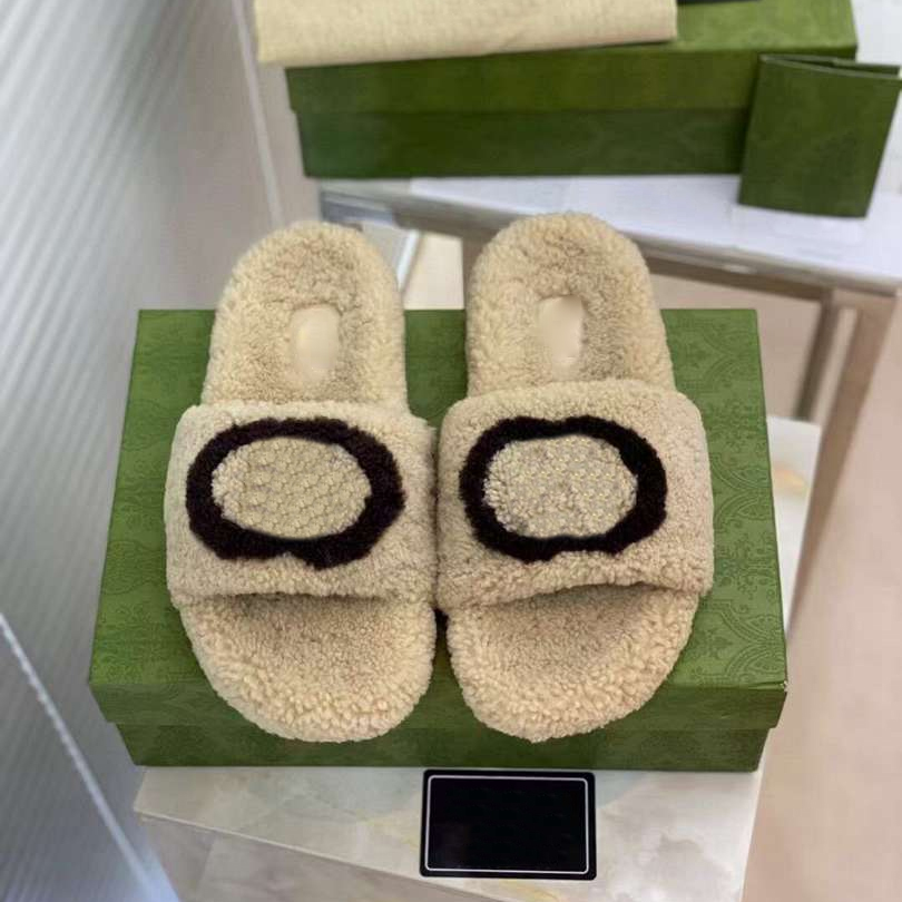 2024 Ny stil tofflor designer glider herr kvinnor plysch tofflor vinter strand glidflat plattform damer sandaler flip flops randig kausal toffel med låda