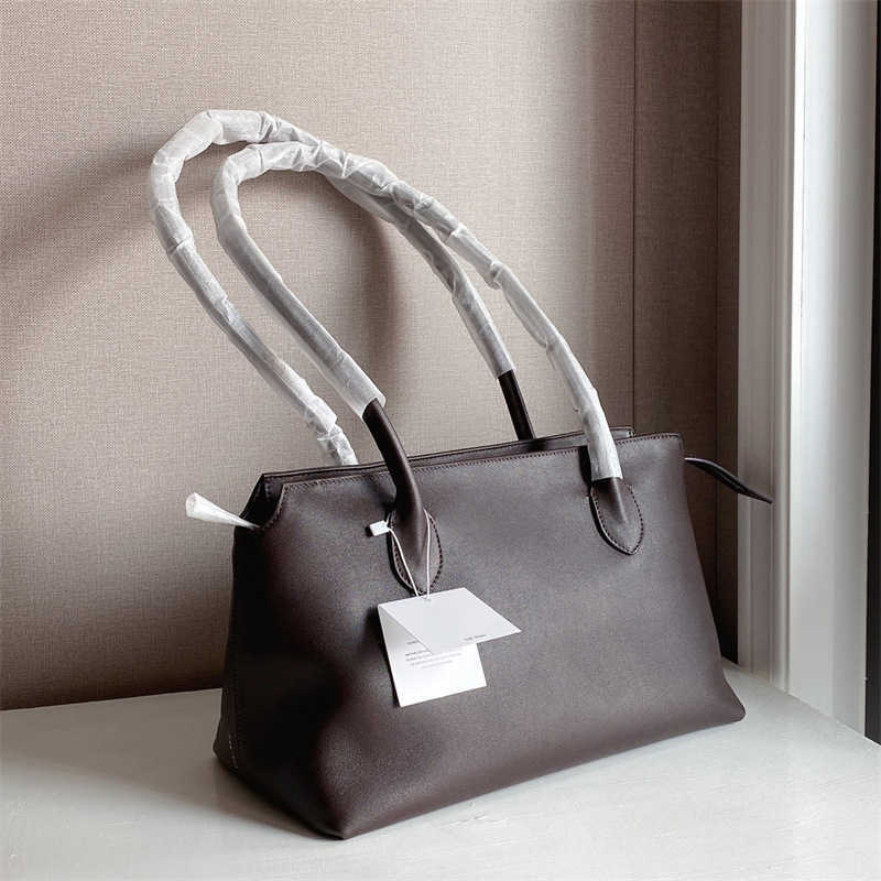 The Row End * Best-quality the 10aaaa High Row Top Layer Cowhide Premium Long Handle Single Shoulder Handbag with Large Capacity Commuting Tote Bag for Women 240105