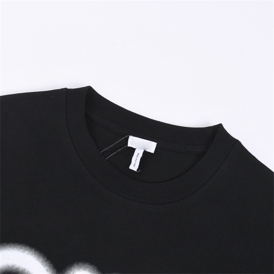 Herr t-shirt sommar amerikansk ungdomtryck logotyp rund nack dropp axel kort ärm lös och enkel mode topp