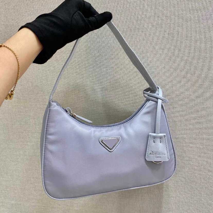 Designer women's handbag P New Nylon Hobo Underarm Middle Age Hanging Tag Law Stick Handheld One Shoulder Vintage Women's Bag Kendou Same Style