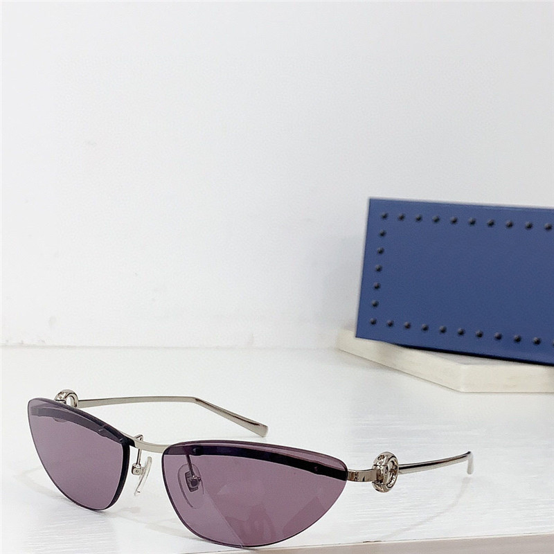 Nouveau design de mode lunettes de soleil en métal 1701S petit cadre oeil de chat lentilles sans monture style simple et populaire lunettes de protection UV400 extérieures