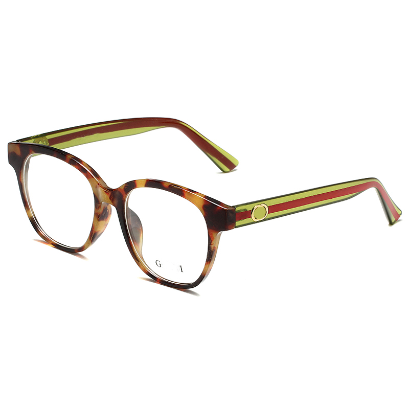 Designers Lunettes de soleil Hommes Femmes Lunettes de soleil Lady Mode Conduite Sports de plein air Voyage Plage Plat avec cadres ronds et lunettes à la mode Cadre circulaire 0040