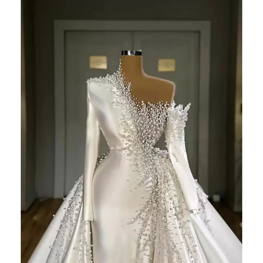 Stunningbride 2024 Abiti da sposa a sirena scintillanti a maniche lunghe con gonna oversize Abito da sposa Una spalla Perline di lusso Perle Cristalli Pieghe Abito da sposa