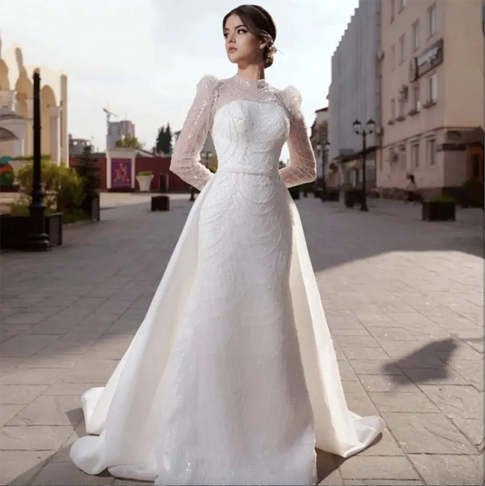 2024 Elegante abito da sposa musulmano le donne Maniche lunghe Sirena con strascico staccabile Collo alto Perle Perline Abiti da sposa Abiti personalizzati Abiti da Noiva