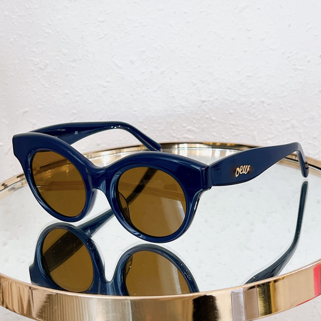 Designer occhiali da sole di donne occhiali da sole uomini ovali bordo nero specchio da tè grigio nero retrò polarizzati vetri in stile neutro alla moda all'aperto