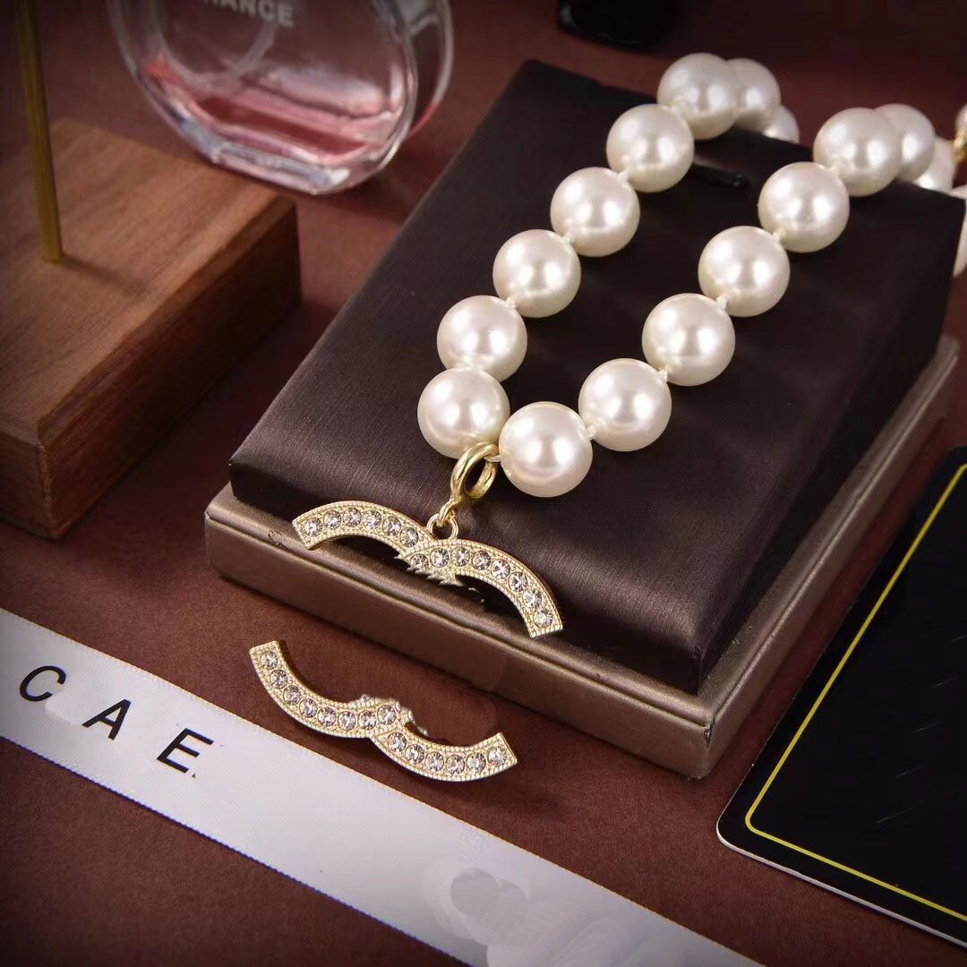 Новое женское жемчужное ожерелье для наушников с печатью, роскошная цепочка для свитера, пара, бутик, подарочное ожерелье, коробка, упаковка, ювелирные изделия высокого качества