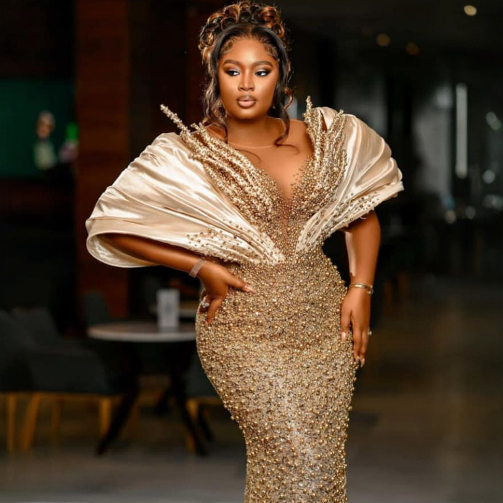 Champagne Aso Ebi Abiti da ballo occasioni speciali Plus Size Illusion Tulle Sirena Perle Paillettes Abiti da sera formali in pizzo Elegante abito da fidanzamento NL539