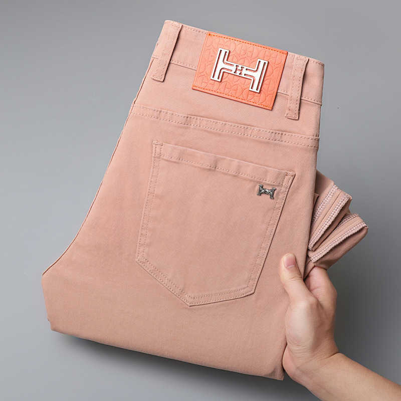 Il designer di turisti maschili Hong Kong Summer Shin Cui rosa jeans rosa jeans alla moda marchio ricamato in edizione coreana Edition di lusso Slimt Fit pantaloni ZCW7