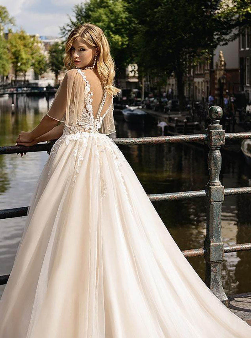 Strand Trouwjurken Doorschijnende Juweel Hals Korte Mouw A-lijn Bruidsjurken Boho Kant Applicaties Bruiloft vestido de noiva