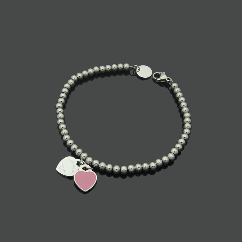 Braccialetti di design da donna color argento con ciondolo a doppio cuore in acciaio inossidabile di lusso con perline a forma di cuore282Q