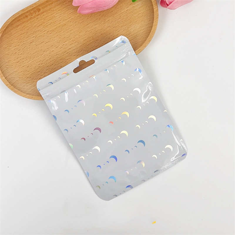 10,5 * 15 cm Laser Star Moon Love Sacchetti imballaggio a chiusura lampo Display in plastica Custodia frontale orecchini Anelli Perle Gioielli Custodia telefono Cavo Caricatore Specchio Stoccaggio al dettaglio